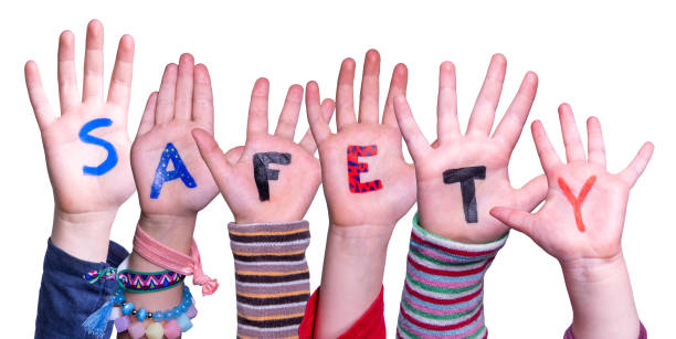 Children Hands Building Colorful Word Safety. White Isolated Background